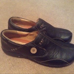 Clarks black leather slip on shoes